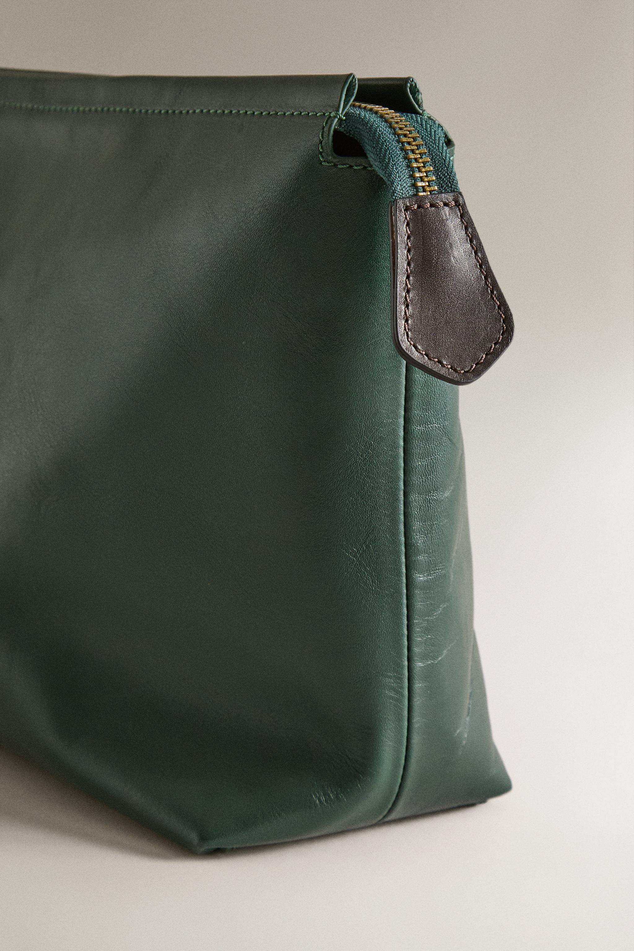 LEATHER TRAVEL MAKEUP BAG